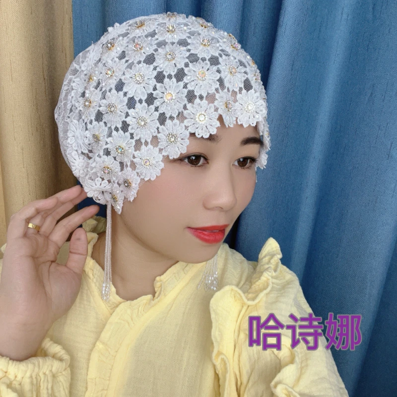 哈诗娜2025年新款手工流苏刺绣帽子包头民族风白发头巾洋气