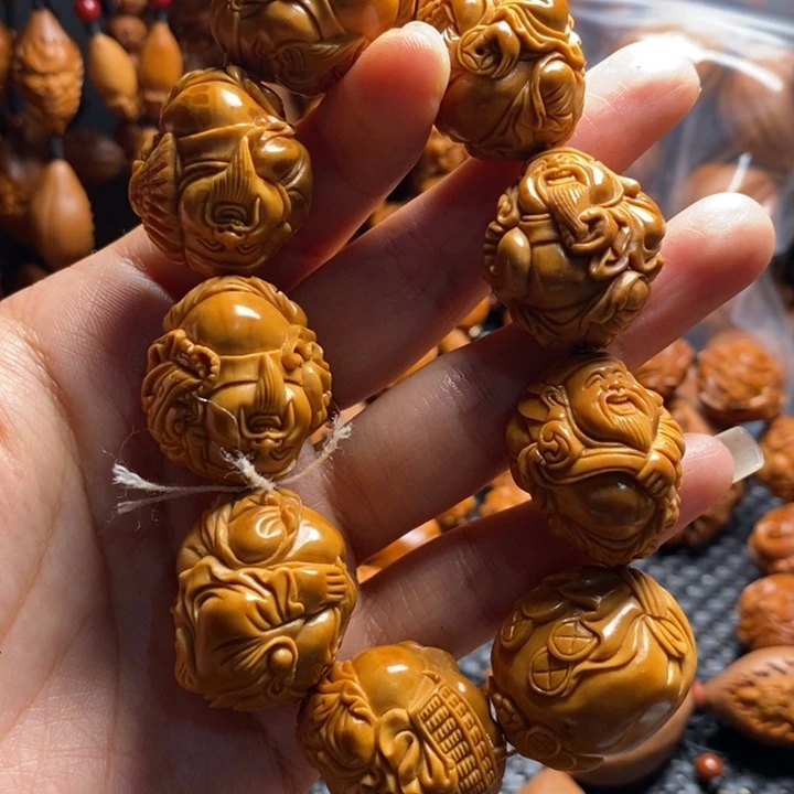 吊坠橄榄核噶**行微上色精品财神