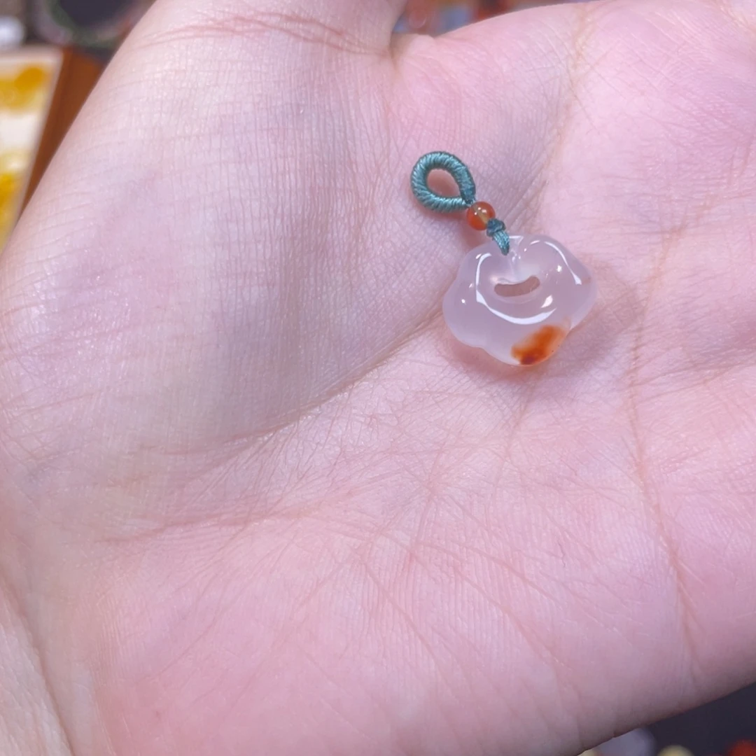 贺***贺南红玛瑙未镶嵌换钱袋差价