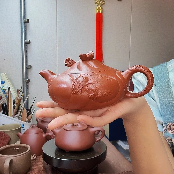陈***…茶壶紫砂鱼化龙360毫升半手