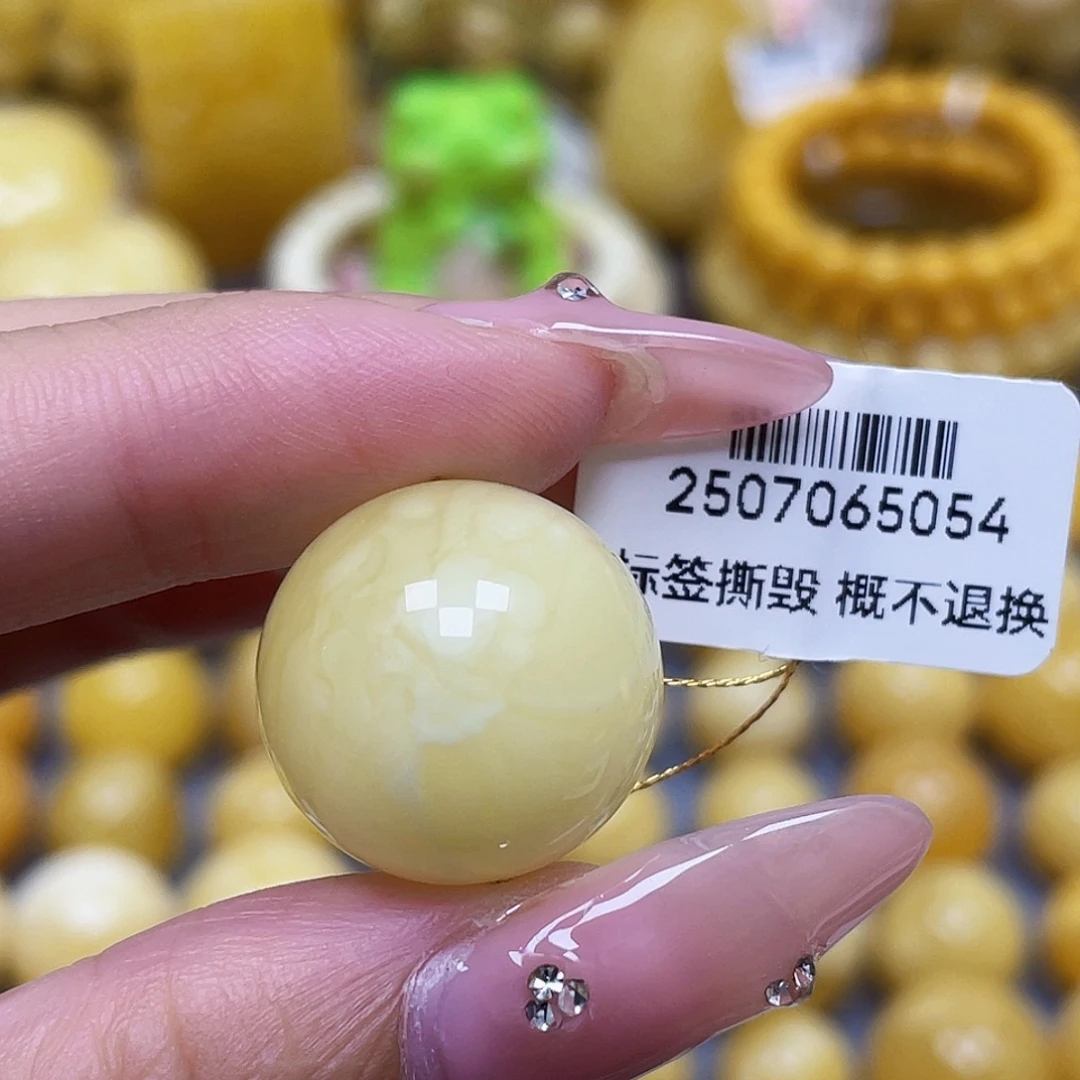 蜜蜡未镶嵌裸石18.9mm瑕