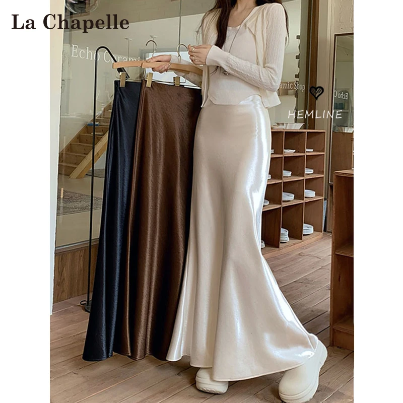 拉夏贝尔杏色醋酸缎面半身裙女2025新款高级感中长款包臀鱼尾裙子