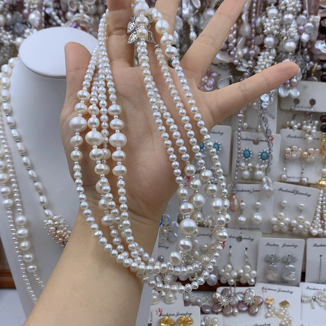 奔***芙淡水珍珠项链耳饰银S925镶嵌