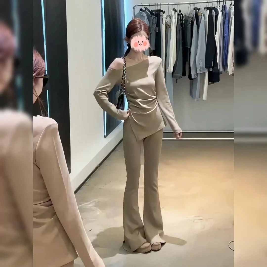 时尚咖色两件套装女2025春季新款一字肩不规则上衣微喇叭裤长裤子