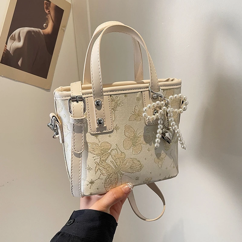 【悠悠蝴蝶】网红女式新款时尚高级感单肩斜挎包小众手提水桶包A827