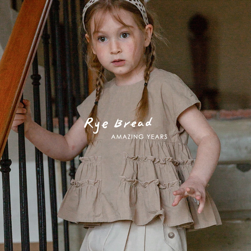 ryebread/黑面包童装 韩系拼接花边女小童百褶下摆小衫4夏