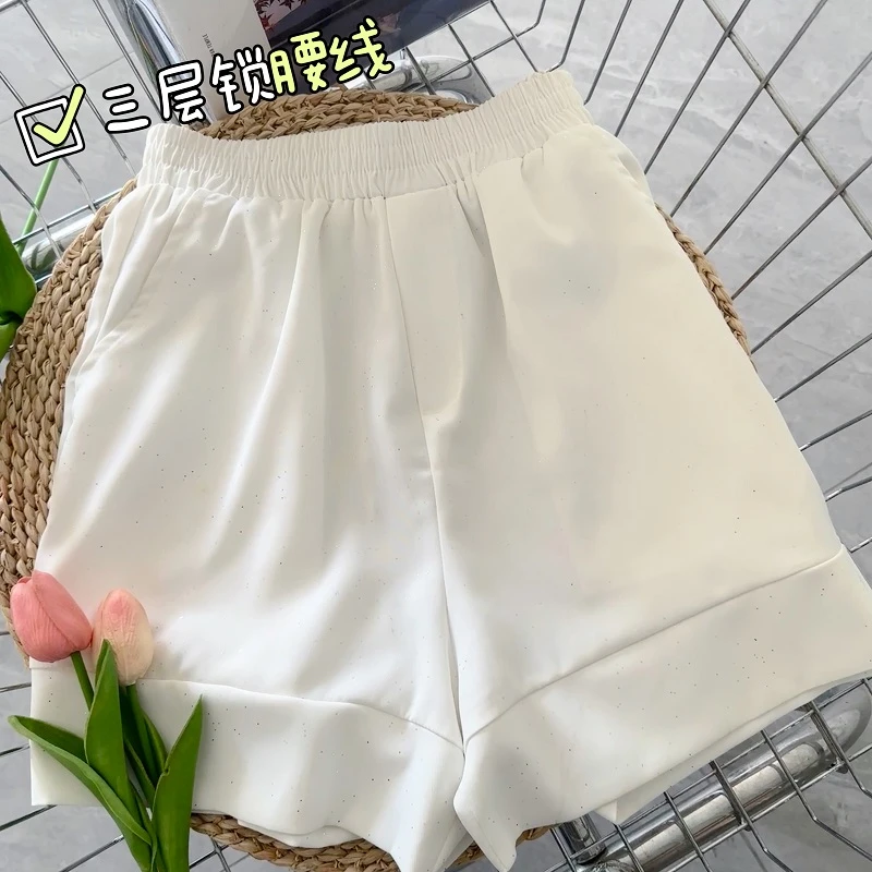 新款时尚百搭细闪气质休闲孔雀斜松紧腰短裤24636