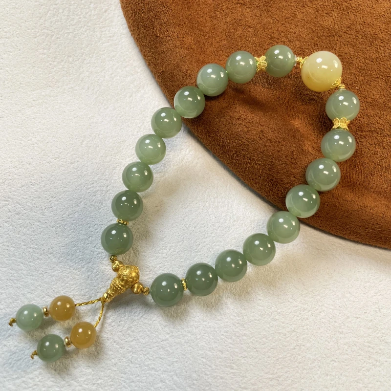 珠联帮【18K】和田玉0.8（荧光粉青）+1.0糖白单圈手串手持