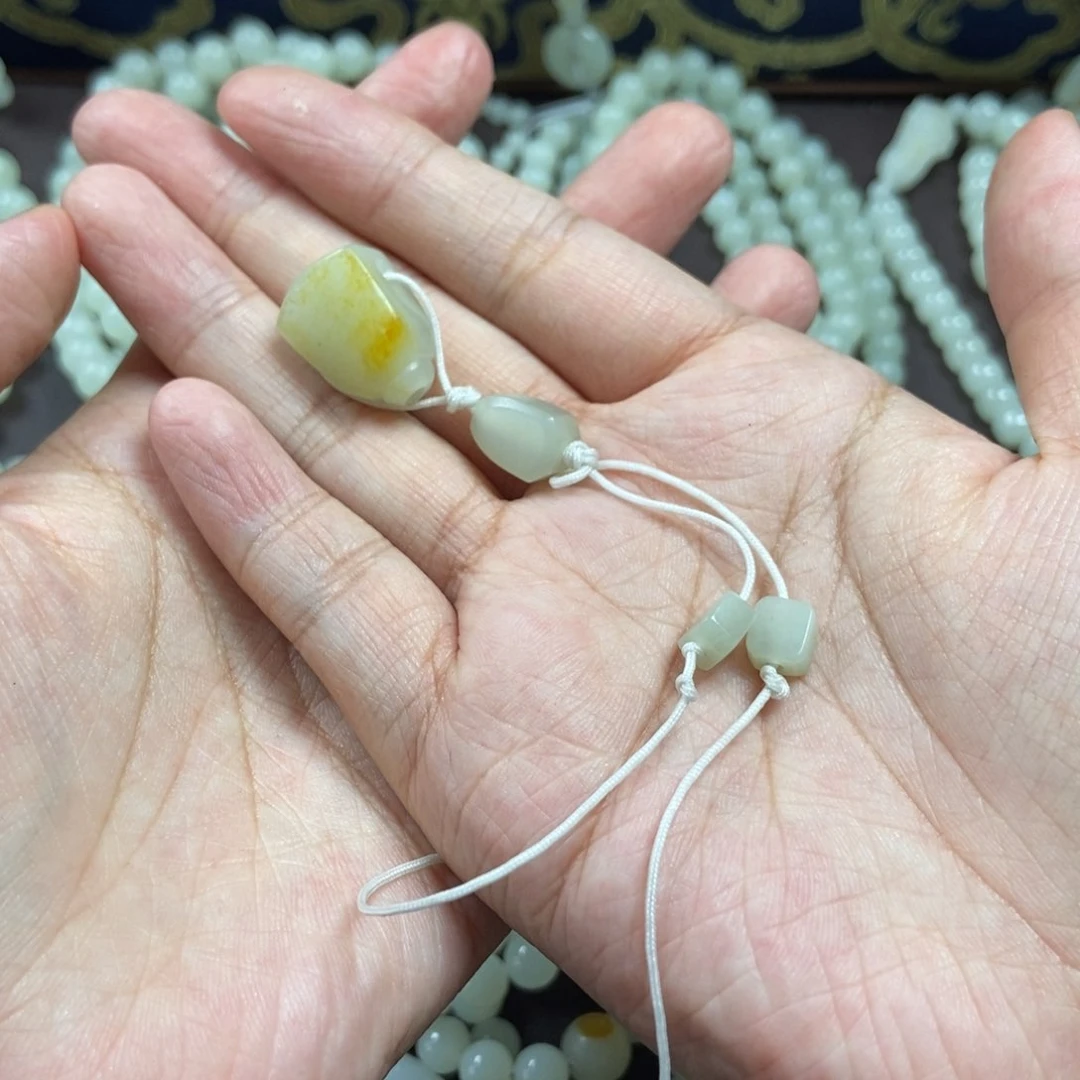 和田玉未镶嵌把件土*金