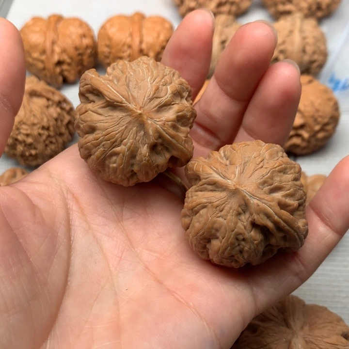 ²****文玩核桃把件铁锤