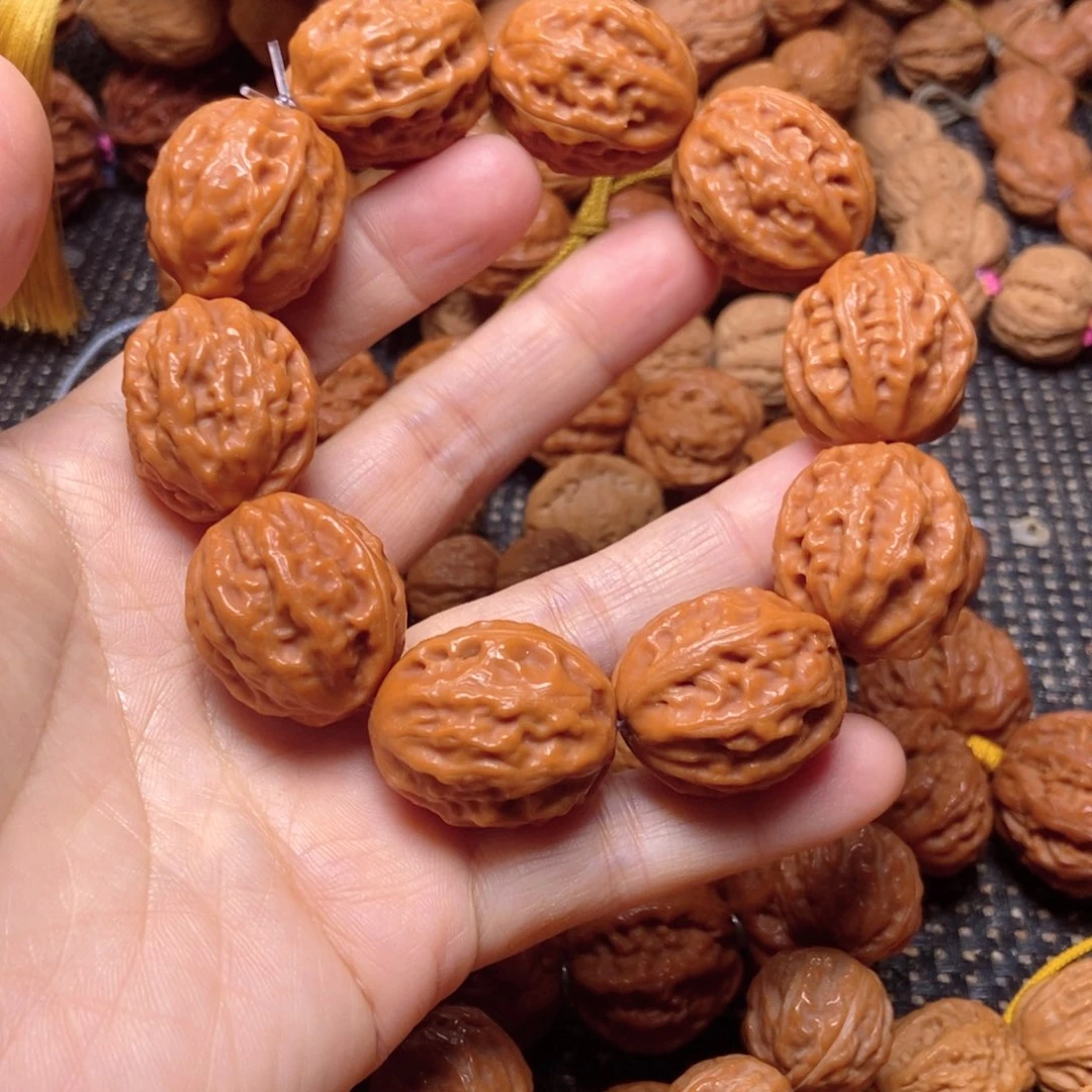 莫***问桃核吊坠八棱手串