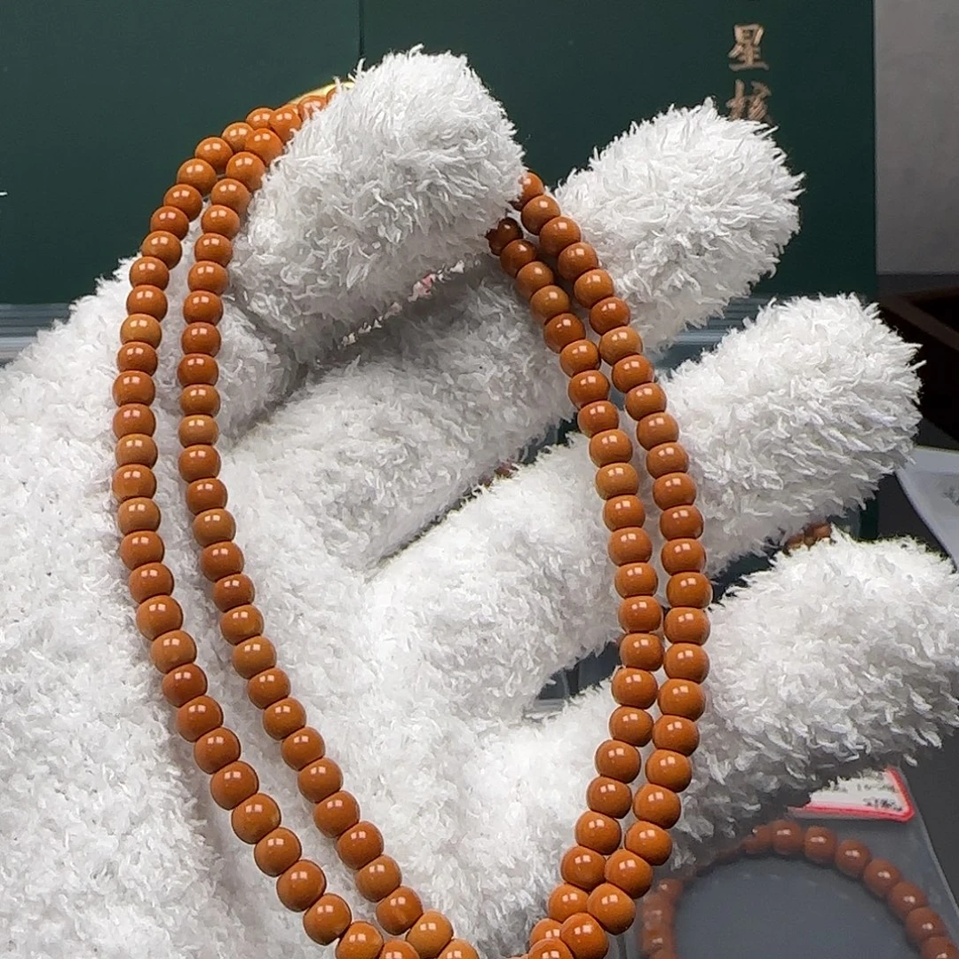 橄榄核吊坠5.0mm老挝红料核尖长串福利款