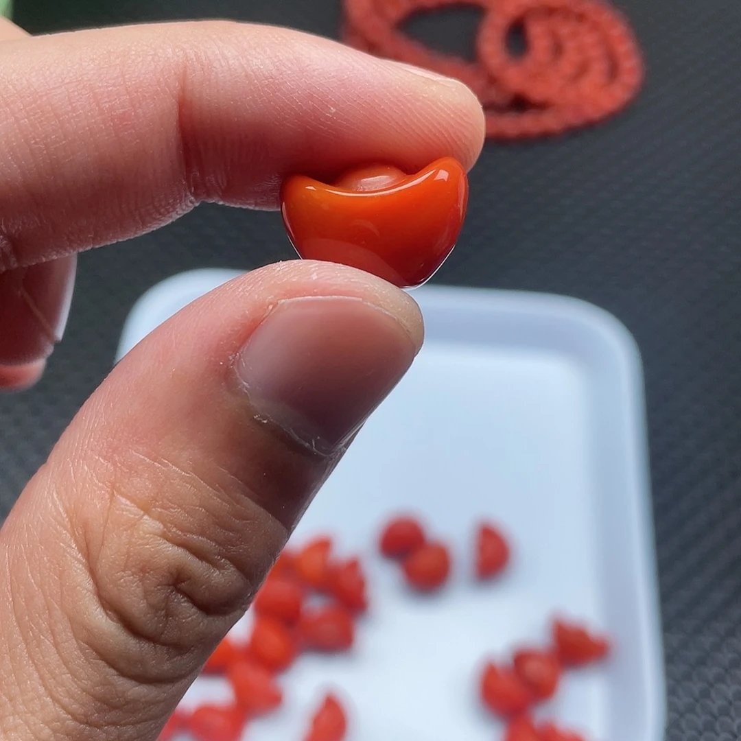 南红玛瑙11*16柿子红元宝一颗未镶嵌