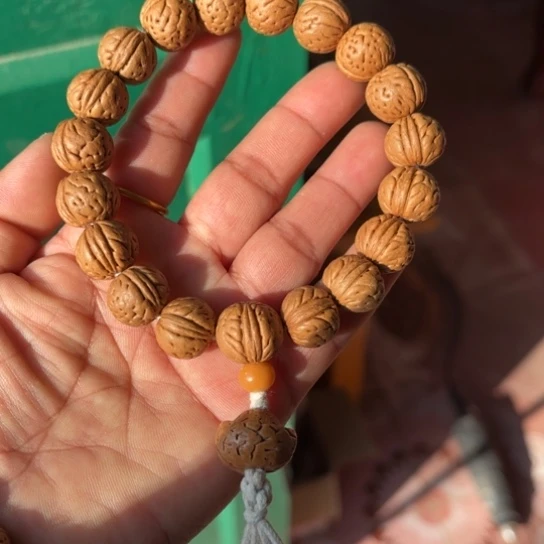 川***鹅木质野生桃核手串