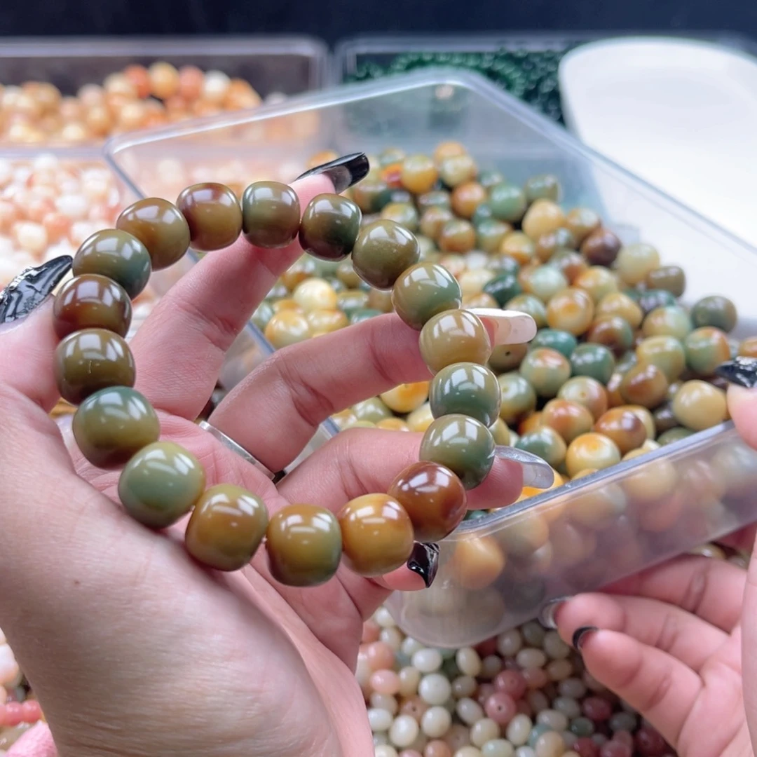 白玉菩提吊坠wq14mm20颗。茉莉儿