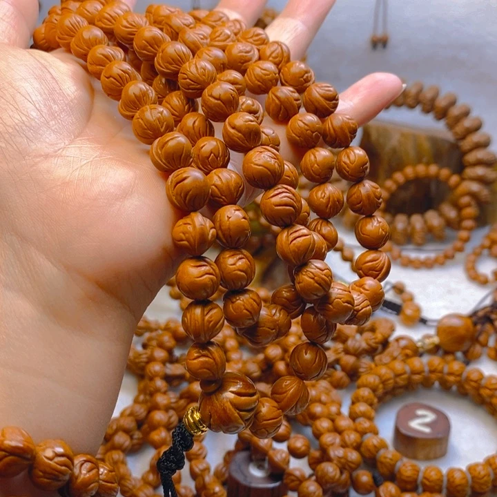 吊坠桃核境**转红皮小龙纹108