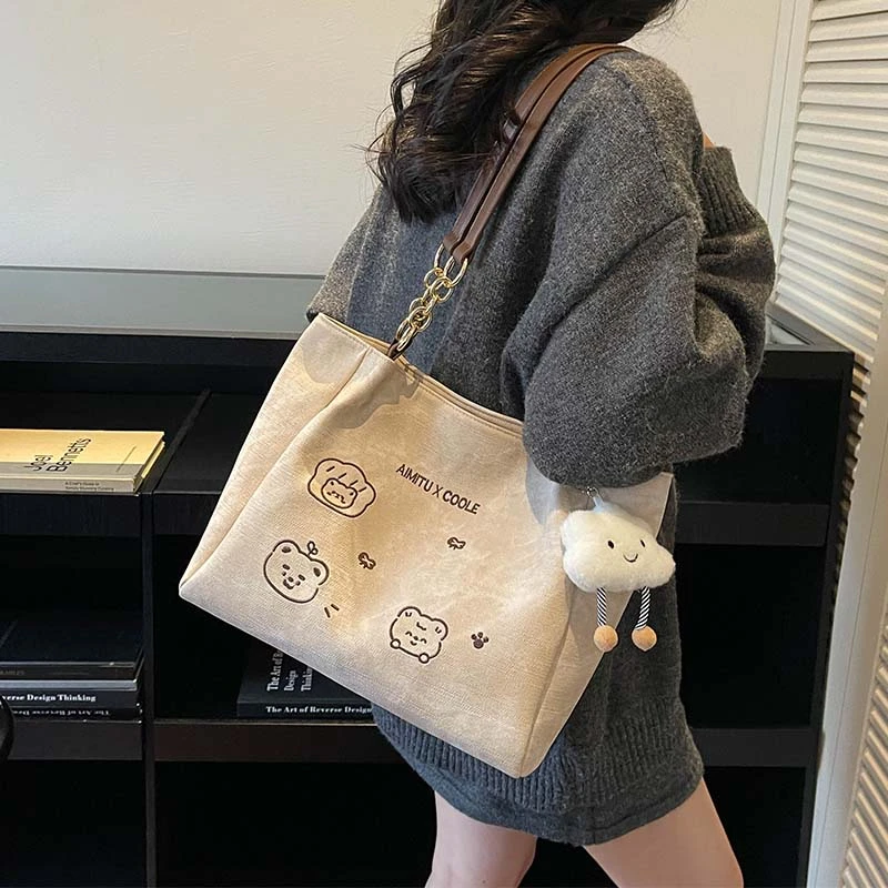 艾米兔女包2025新款休闲日常大容量学生包包百搭小众单肩托特包