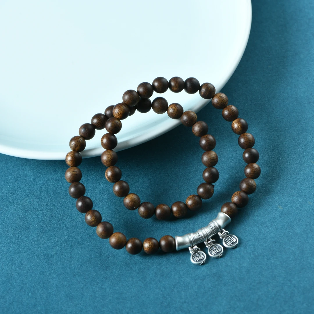 沉香大叻黑奇楠沉水0.6双圈手链足银多福节节高