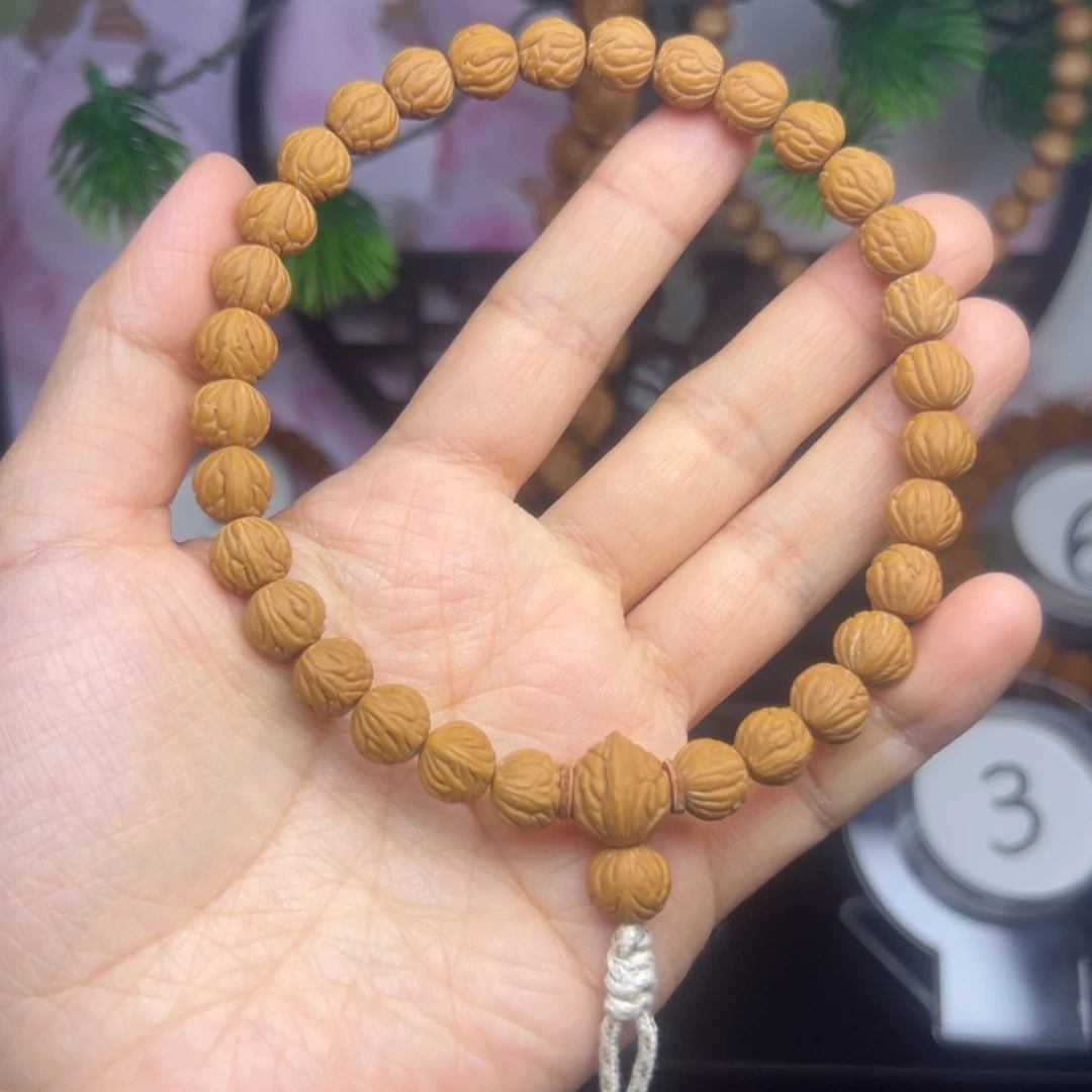 你***好桃核吊坠龙纹桃核手持