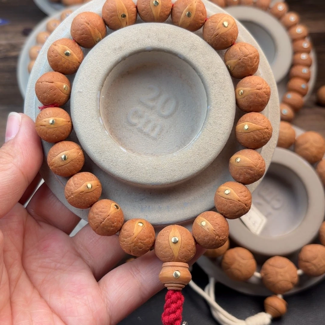 凤眼菩提手串14.5mm红皮黄金眼镶嵌