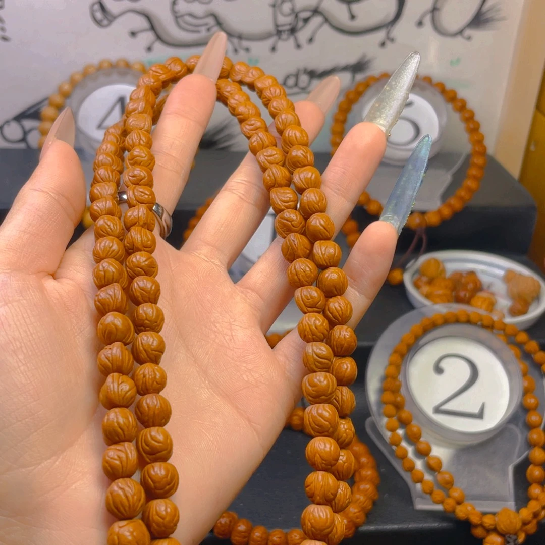 利***利桃核吊坠0.888888888888