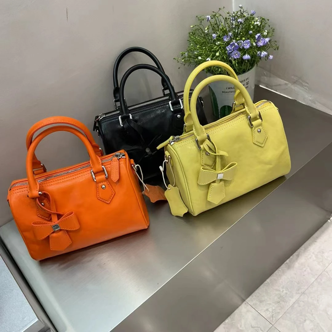 馨馨家 (知夏) 进口水晶植揉胎牛三彩枕头包水桶包单肩斜挎手提包