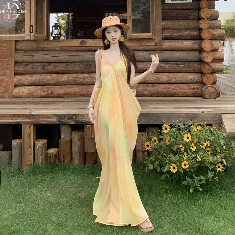 黄色扎染吊带连衣裙女夏多巴胺明媚绝美海岛川西海边度假沙滩长裙