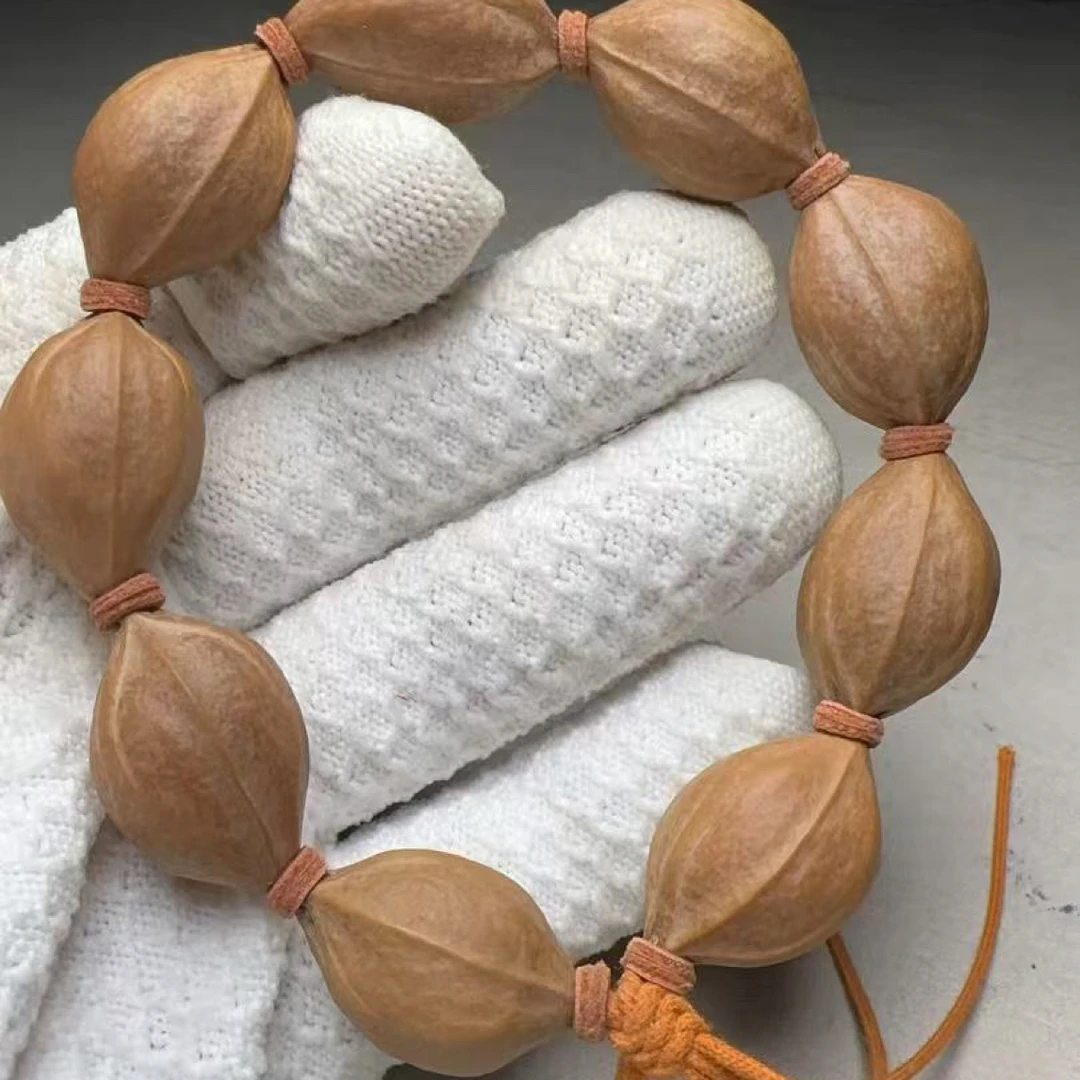 广东梅林铁核橄榄核原皮尺寸1.9cm×2.7cm