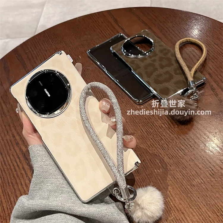 适用华为matex5手机壳折叠全包x6典藏版秋冬豹纹毛球手绳磁吸中轴