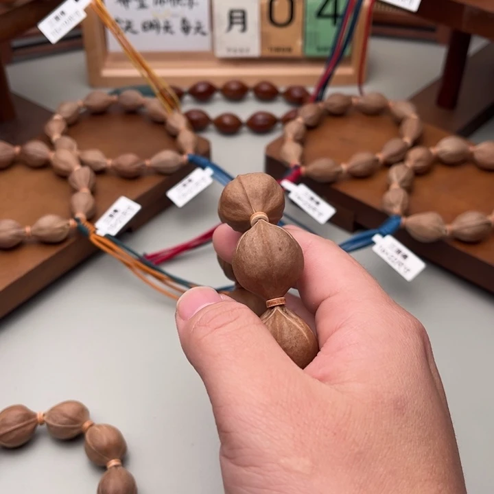 爱***花手串/手链橄榄核梅林铁核