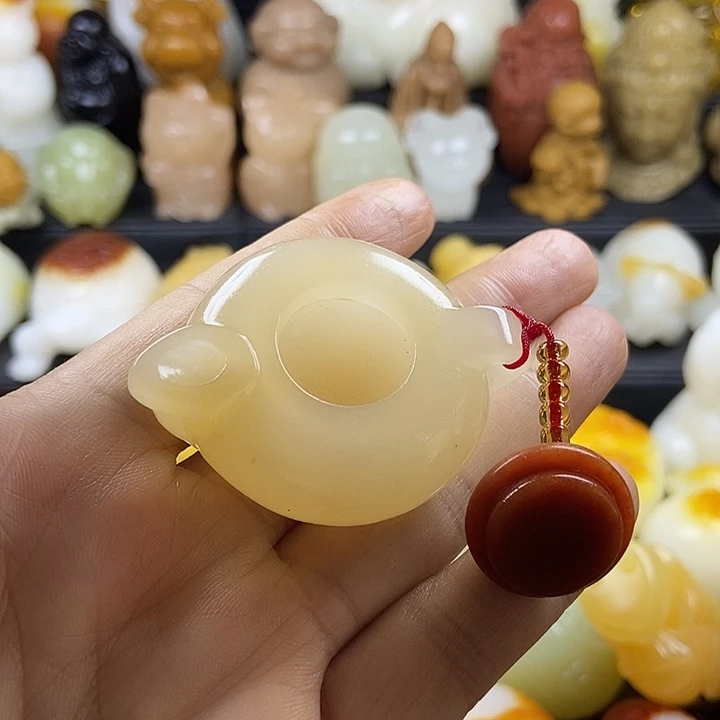 无花朵原石手把件