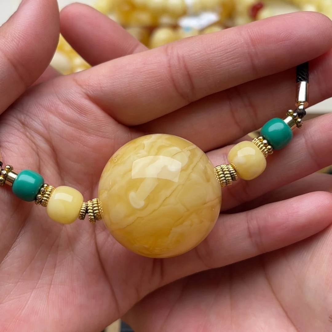 琥珀未镶嵌裸石蜜蜡圆珠笑