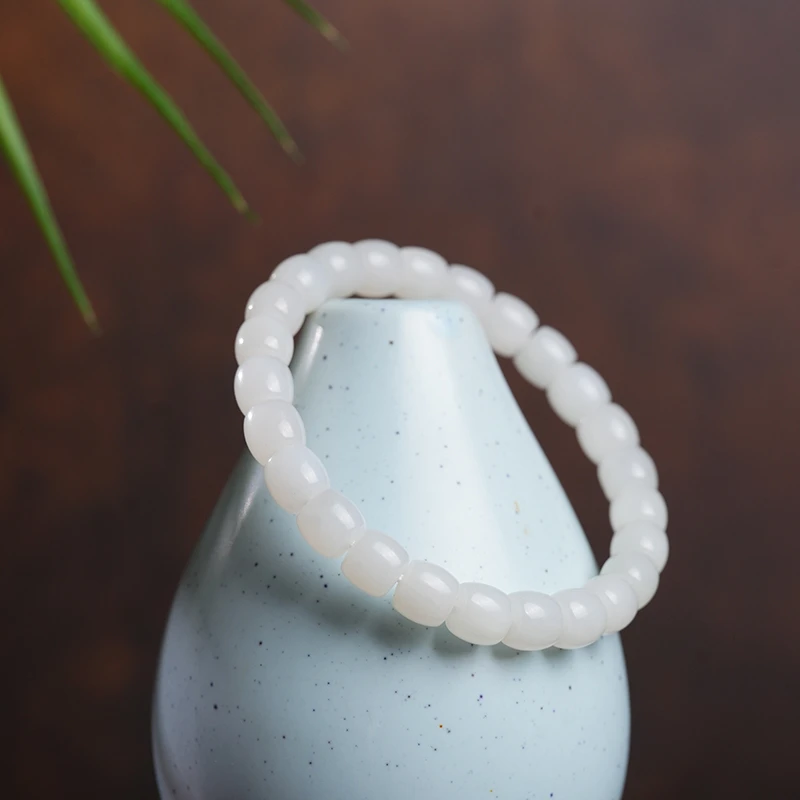 新疆和田玉且末天泰 白玉极限弧卡7-8手串多样性发一件