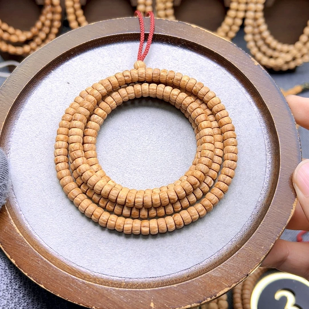 叫***劉手串柏香籽/百香籽