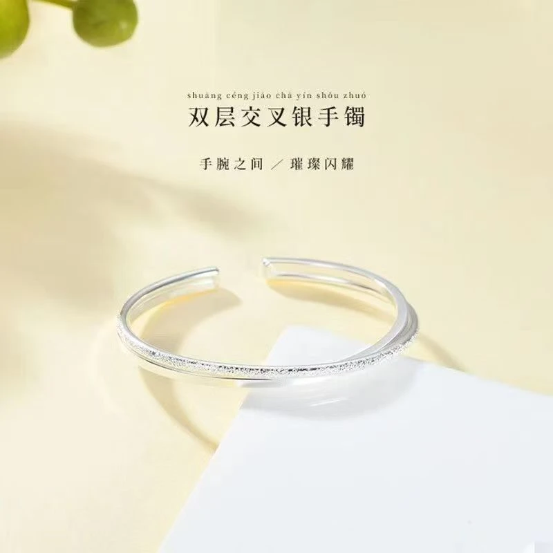 9999钉沙亮面交叉开口银手镯