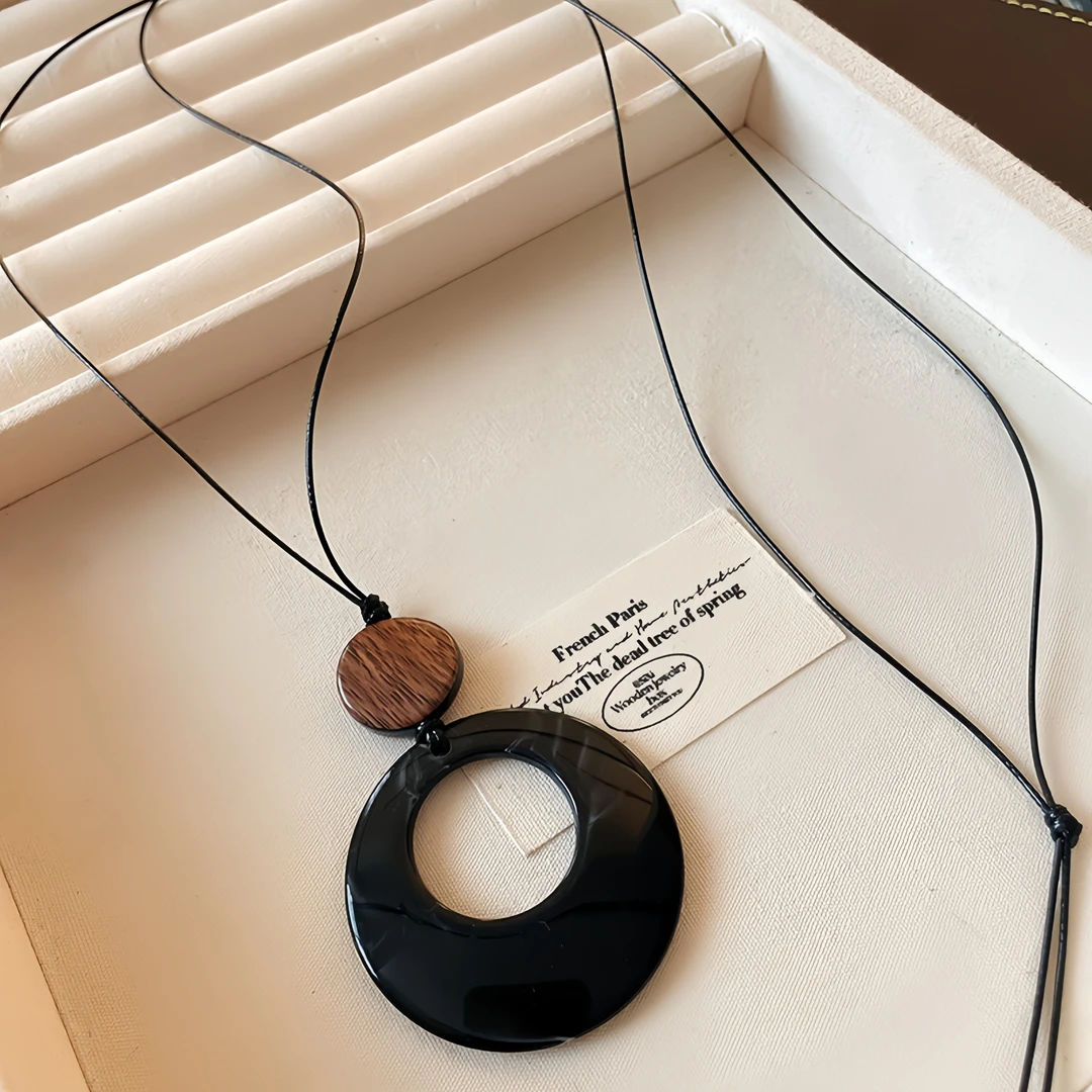 DOU×【精致单品】秋冬新款小众简约新中式设计黑绳圆环吊坠长款配饰