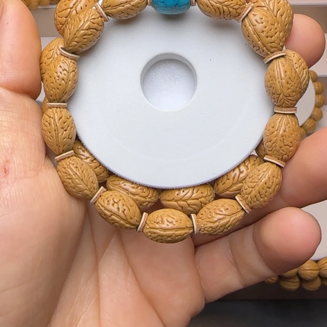 ****桃核手串麦穗钱袋子