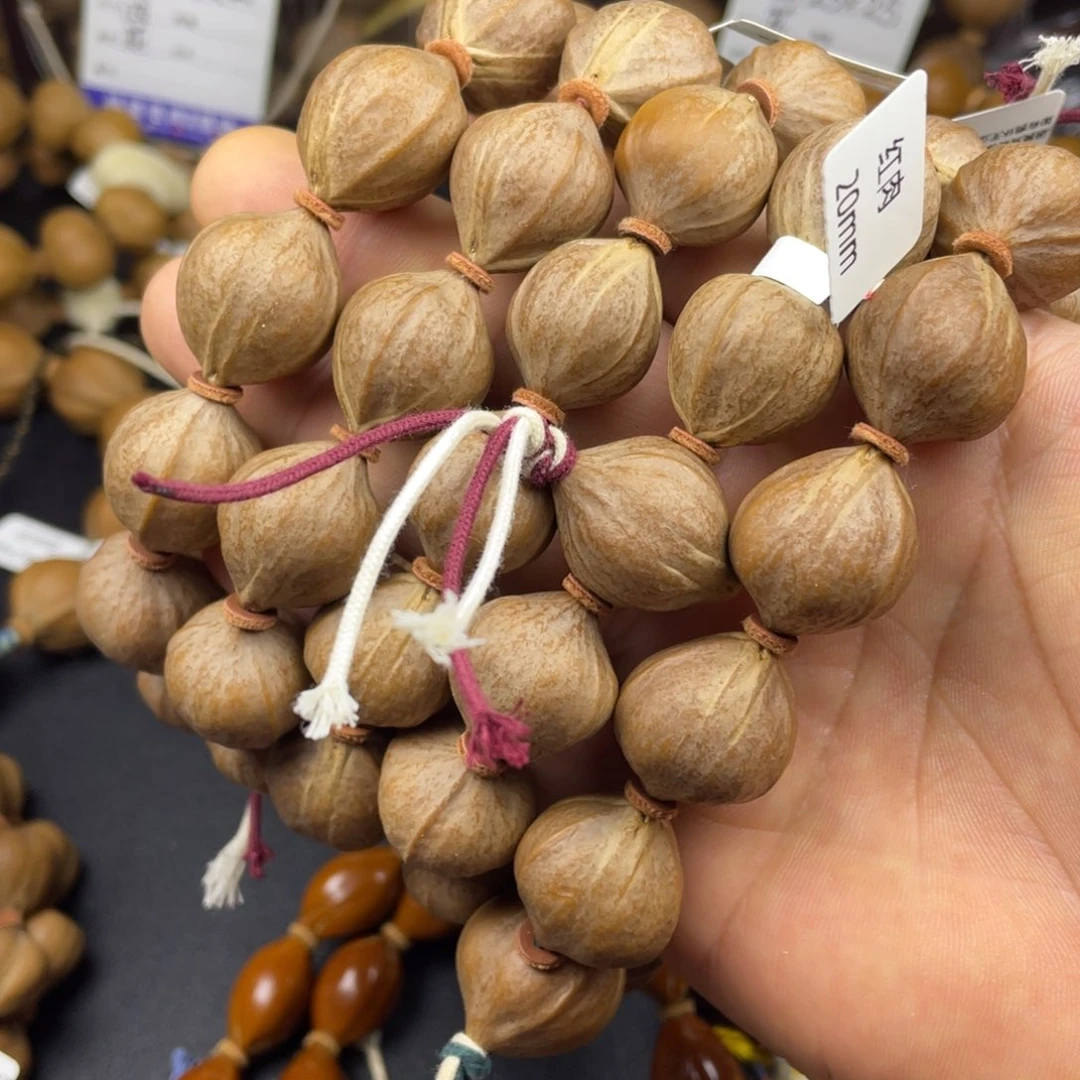 于***.橄榄核手串爆红老料