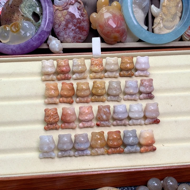 硅化珊瑚（珊瑚玉）未镶嵌颈饰玉****子