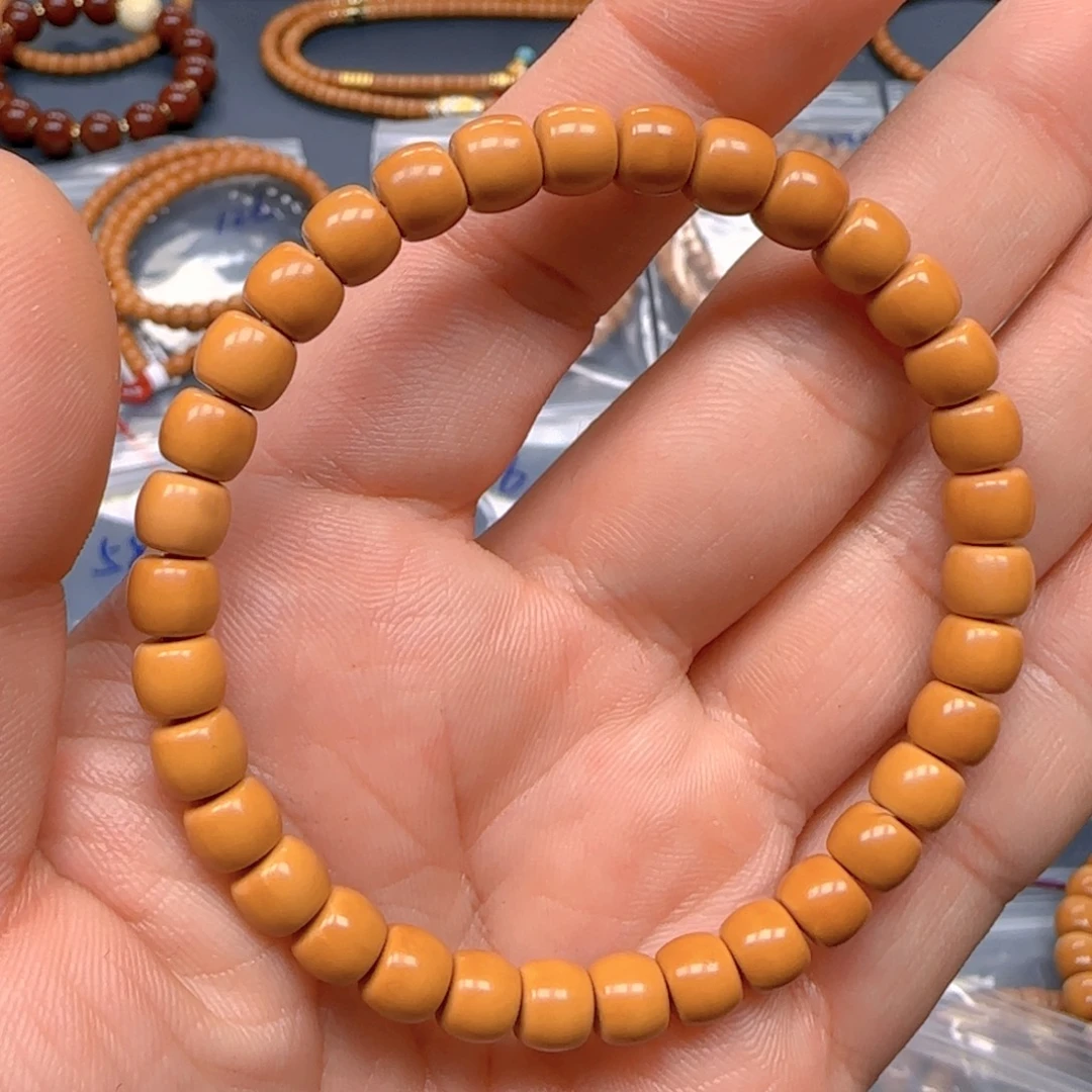 轩***手串橄榄核老挝SS级核尖极限弧尺寸6.9