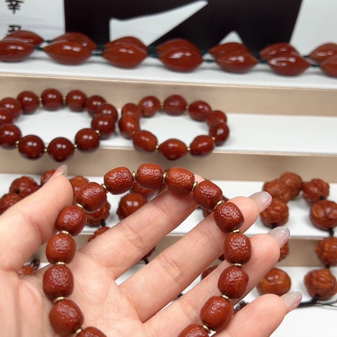隧***远橄榄核手串橘皮老型