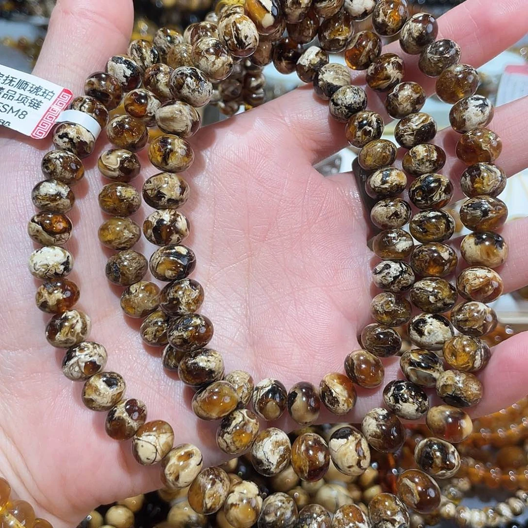 王***道琥珀未镶嵌手链9m花