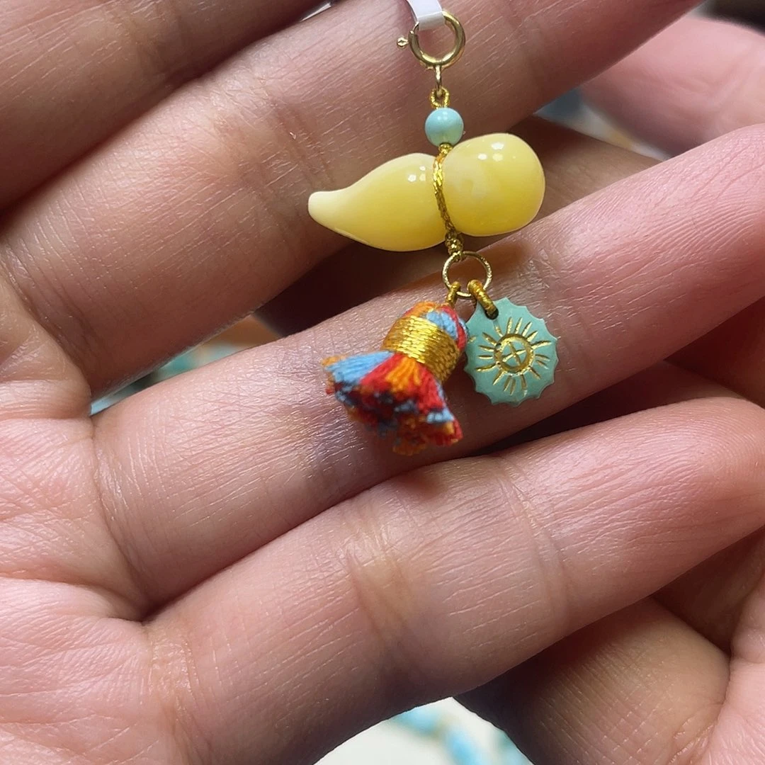 琥珀18K金镶嵌裸石滴流