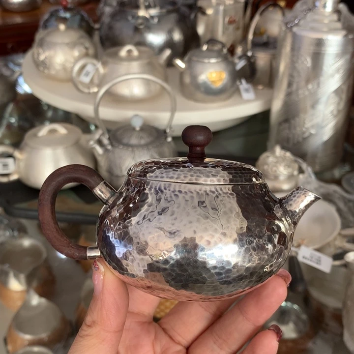 足银999锤纹紫皮茶壶150容量
