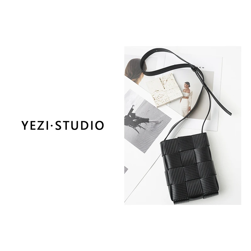 设计感经典牛皮编织手拿斜挎头包 24255014