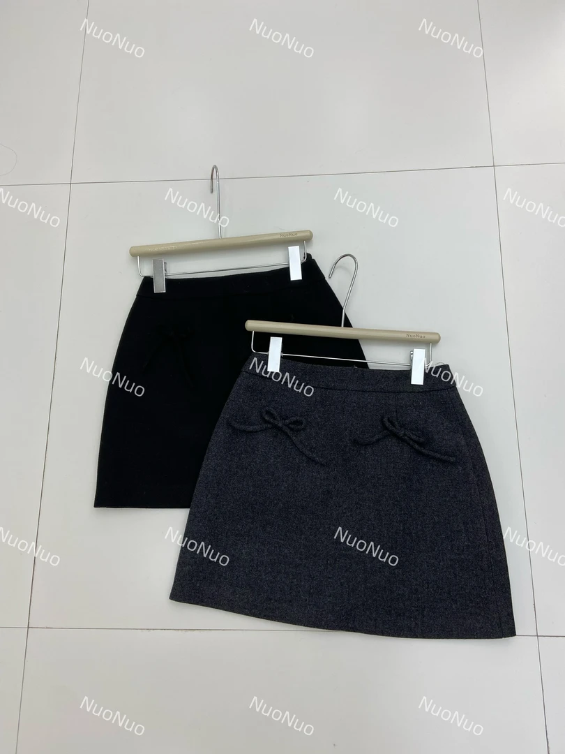 36961韩系立体蝴蝶结毛呢半身裙