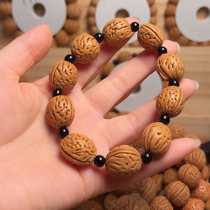 小***飞文玩核桃吊坠钱袋子手串