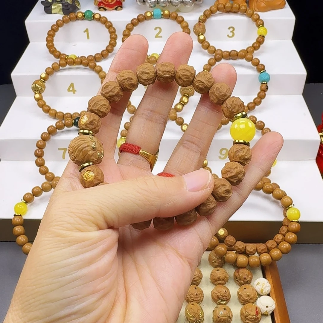 郭***猴头核桃吊坠猴头手串