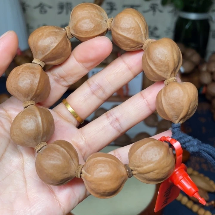 玛****橄榄核手串/手链梅林铁核2424手串
