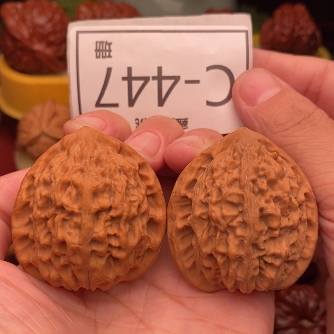 桃核把件金牛40…..